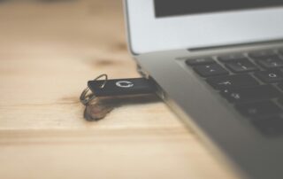 a USB stick connected to a laptop